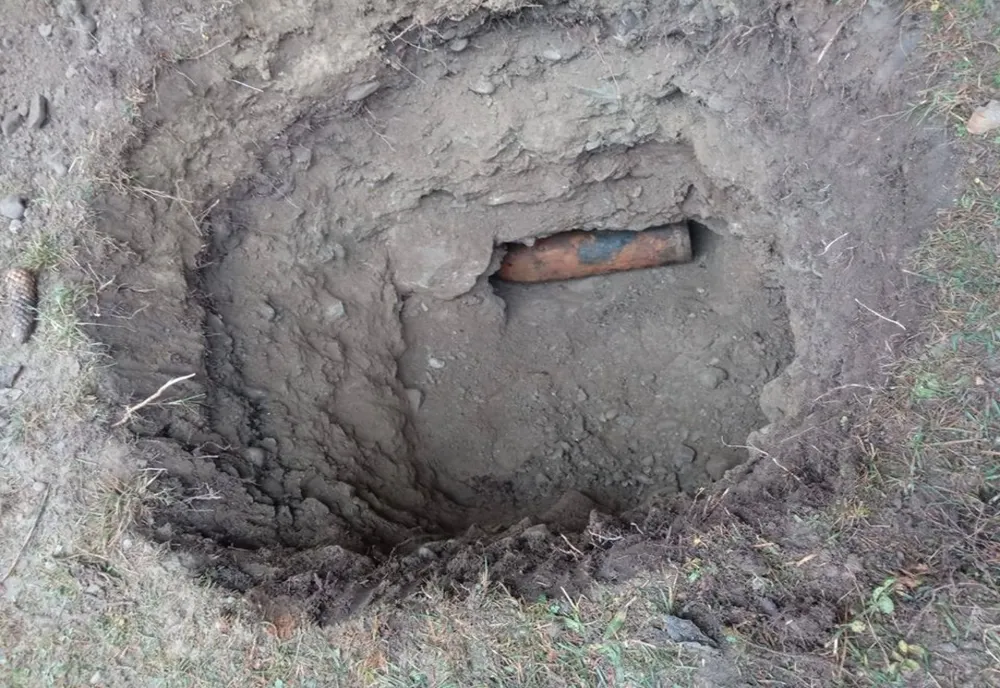 FOTO - VIDEO: Bombă de 50 de kilograme, găsită în albia pârâului Agăș!